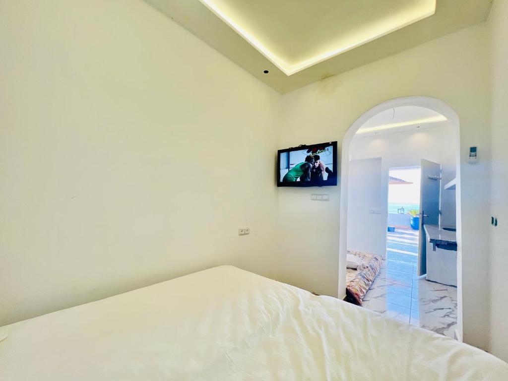 Chambre Double Deluxe – Vue Latérale sur Mer