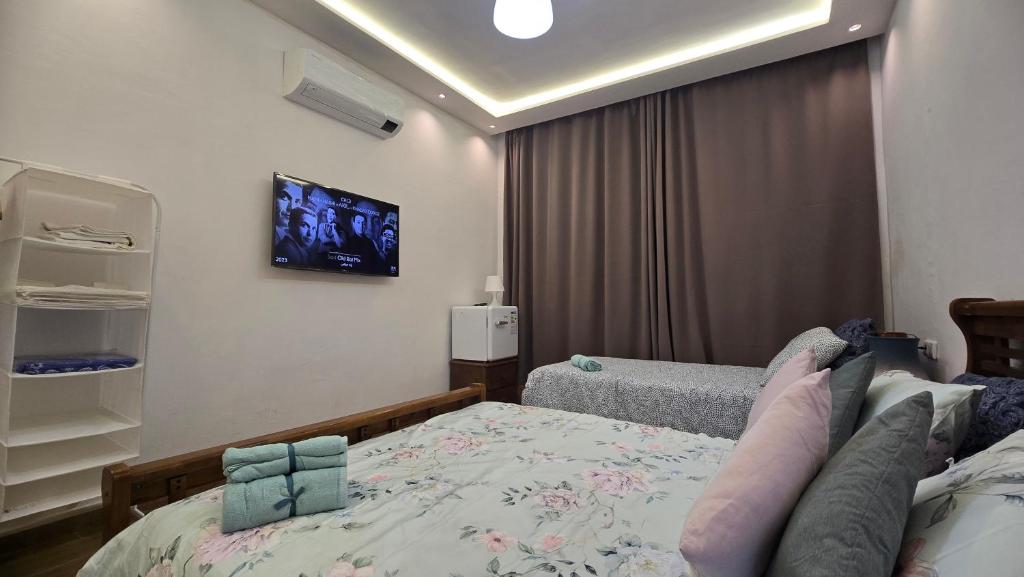 Chambre Triple avec Salle de Bains Privative